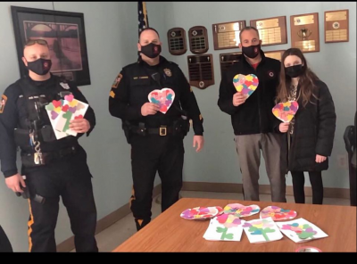 Officers with cards